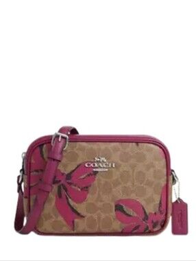 Coach Signature Canvas Camera Bag with Pink Bow Accents